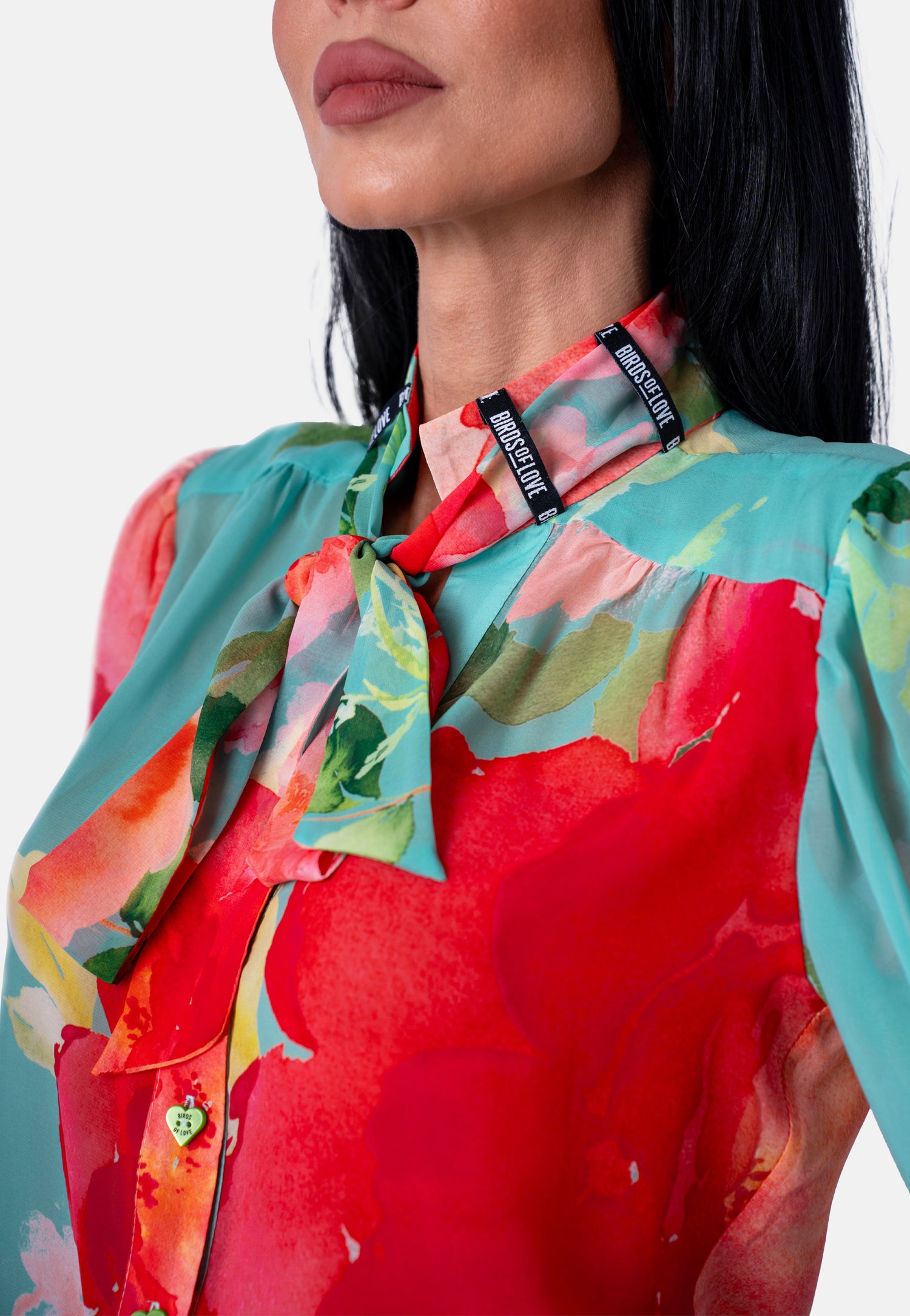 Bluse mit Blumenprint und Bindeelementen in Mint und Rot | Jardin by Birds of Love