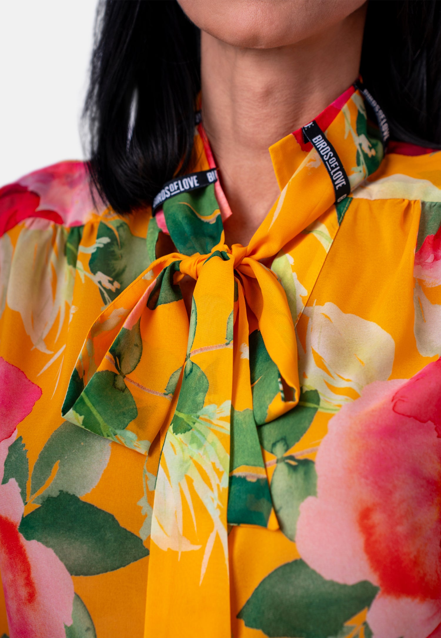 Bluse mit Schleife und Blumenprint in Gelb